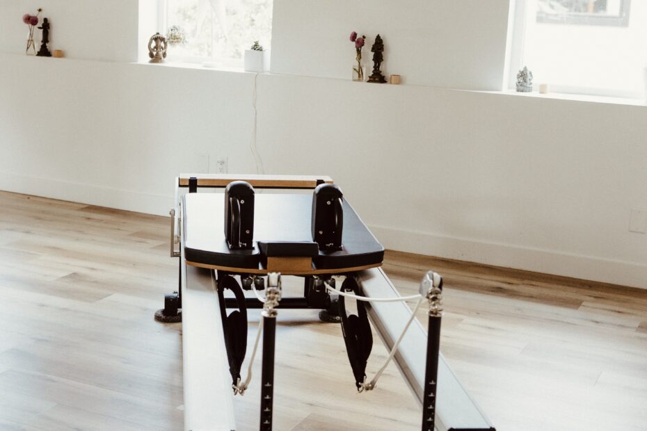 A pilates reformer installed in the light and bright Embodied studio