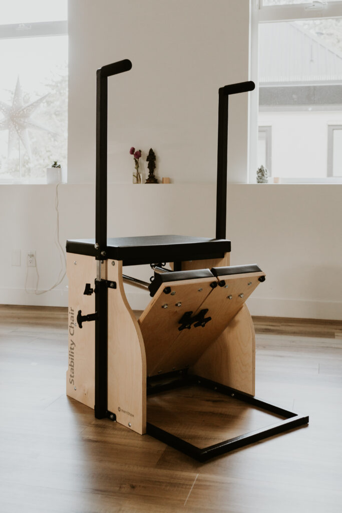 A pilates chair installed in the light and bright Embodied studio